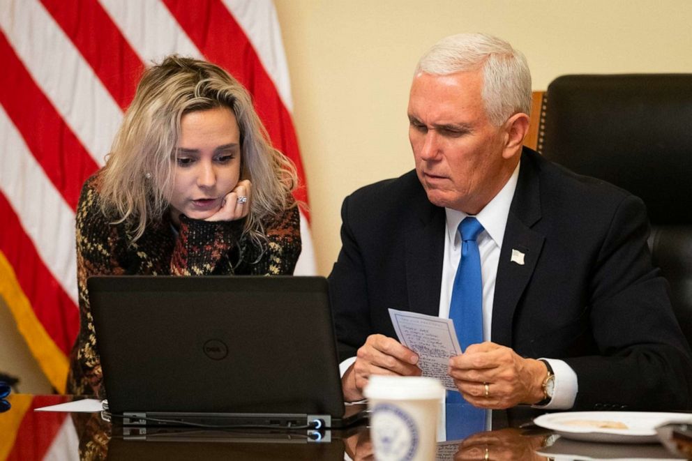 Vice President Mike Pence, with his daughter Charlotte, works on the speech he would give to the joint session when Congress reconvened to certify Joe Biden's election after he returned to the Capitol on Jan. 6, 2021